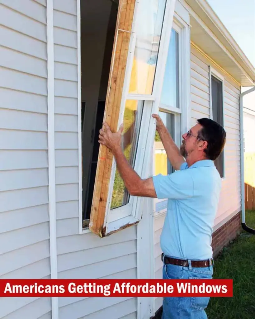 Man installing window