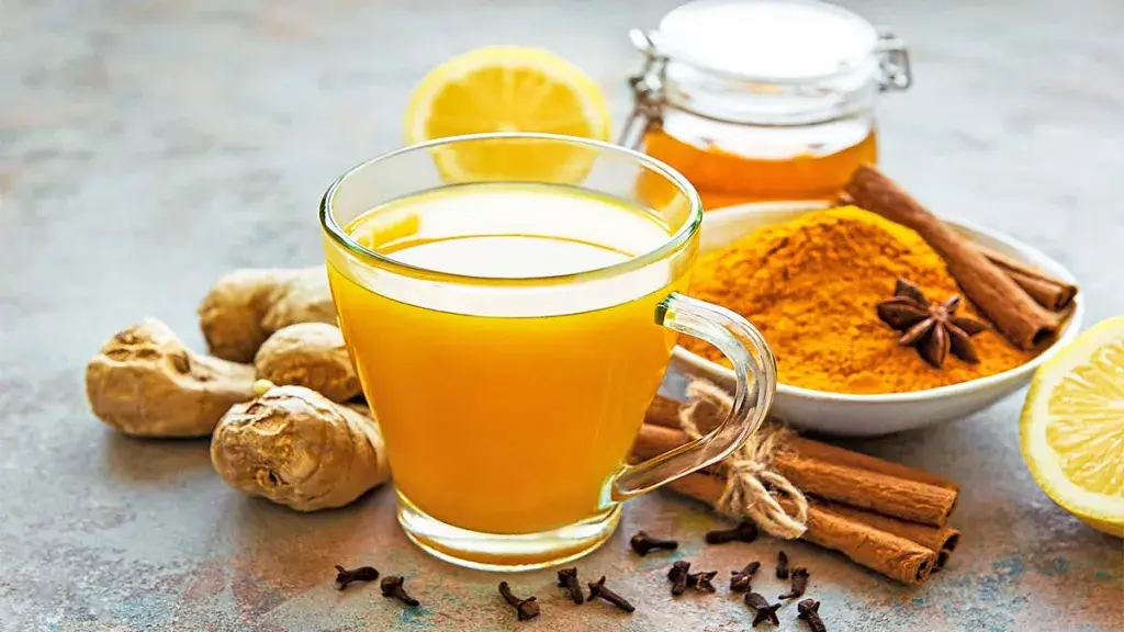 Natural wellness morning ritual with turmeric and ginger